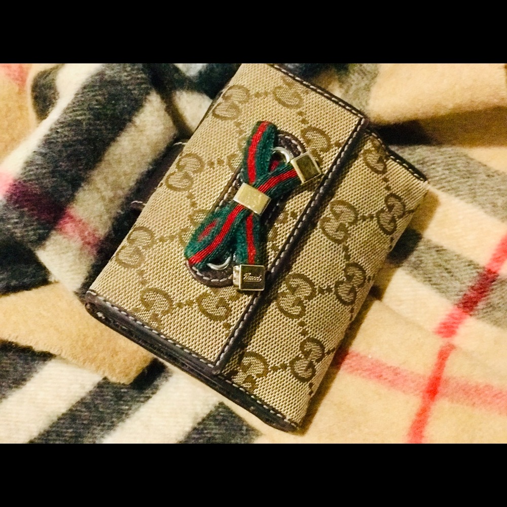 Authentic Gucci Monogram Bow Wallet